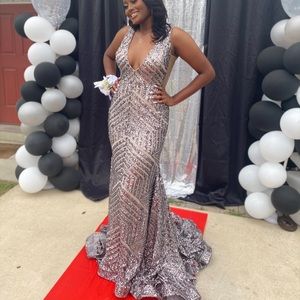 Selling my Prom Dress. Size 10. Worn once, perfect condition. Dry Cleaned.